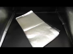 マイクロパフォーレッドバッグ